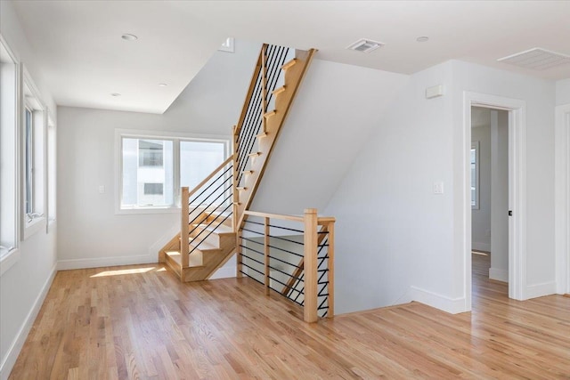 12 Pershing Pl, Island Park, NY 11558 - staircase featuring wood finished floors