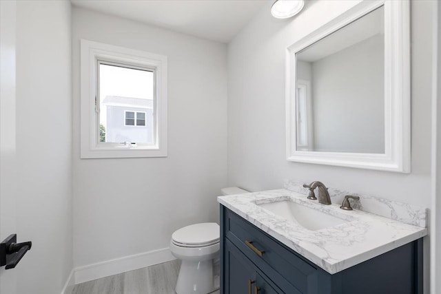 12 Pershing Pl, Island Park, NY 11558 - bathroom featuring vanity and wood finished floors