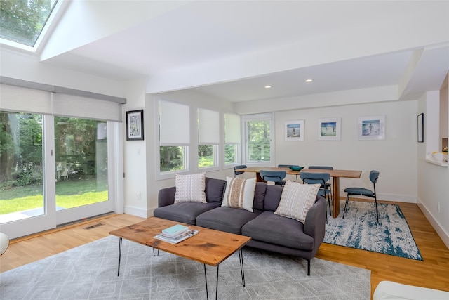 10 Head Of Pond Rd Unit 8, Water Mill, NY 11976 - living area featuring healthy amount of natural light, wood finished floors, recessed lighting, and baseboards