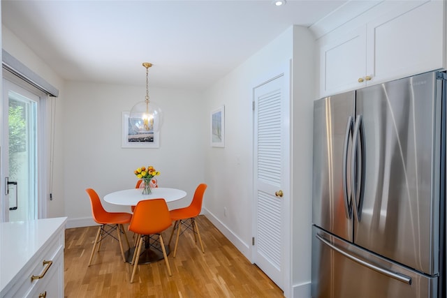10 Head Of Pond Rd Unit 8, Water Mill, NY 11976 - dining room featuring light wood-type flooring, baseboards, and recessed lighting