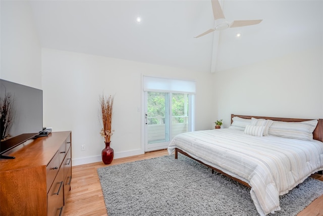 10 Head Of Pond Rd Unit 8, Water Mill, NY 11976 - bedroom with light wood-style flooring, access to exterior, baseboards, recessed lighting, and vaulted ceiling
