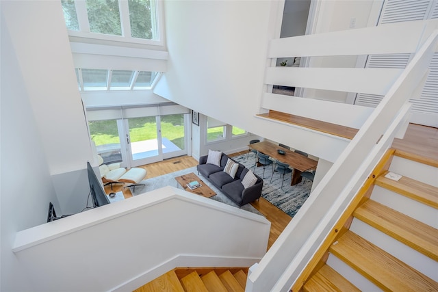 10 Head Of Pond Rd Unit 8, Water Mill, NY 11976 - staircase with wood finished floors