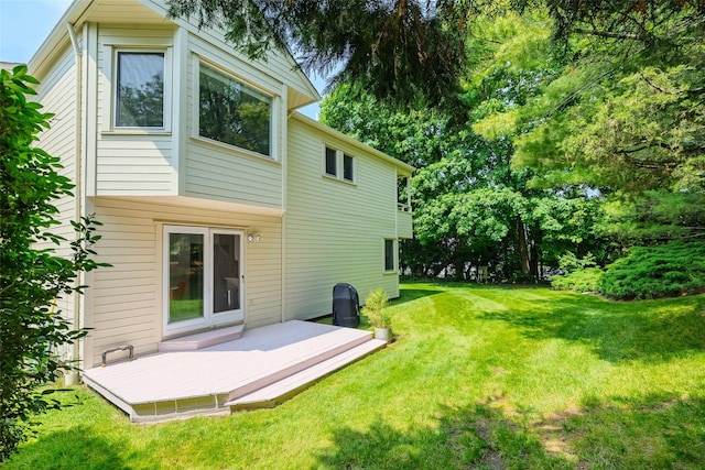 10 Head Of Pond Rd Unit 8, Water Mill, NY 11976 - back of house with a deck and a yard