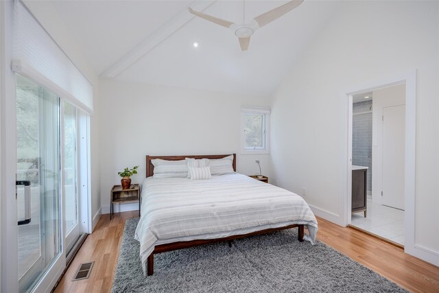 10 Head Of Pond Rd Unit 8, Water Mill, NY 11976 - bedroom featuring light wood-style flooring, high vaulted ceiling, ceiling fan, baseboards, and ensuite bath