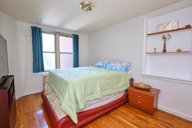 67-25 Clyde St Unit 2L, Forest Hills, NY 11375 - bedroom featuring light wood-style flooring and baseboards