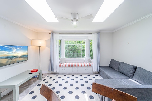 9 Higgins Trl, Monroe, NY 10950 - sitting room featuring a skylight, crown molding, and a ceiling fan