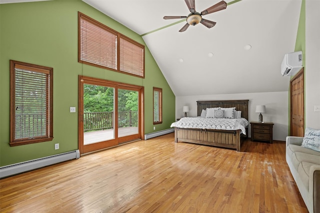 1775 Plank Rd, Forestburgh, NY 12777 - bedroom with a wall unit AC, access to exterior, baseboard heating, wood finished floors, and high vaulted ceiling