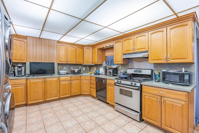 5801 59th St, Maspeth, NY 11378 - kitchen featuring black appliances, under cabinet range hood, tasteful backsplash, and a drop ceiling