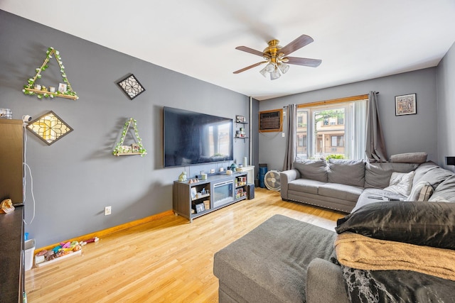 5801 59th St, Maspeth, NY 11378 - living area featuring wood finished floors and ceiling fan