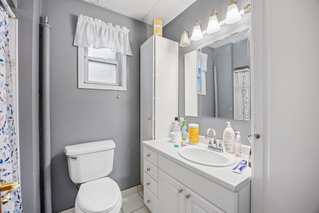 5801 59th St, Maspeth, NY 11378 - full bath featuring vanity, toilet, tile patterned flooring, and a shower with curtain