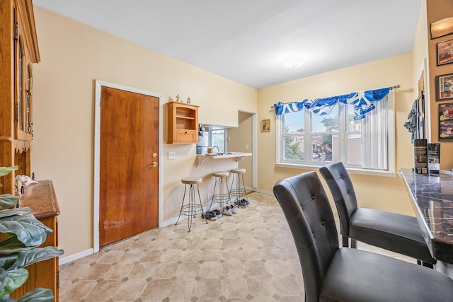 5801 59th St, Maspeth, NY 11378 - office area featuring baseboards
