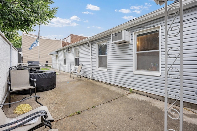5801 59th St, Maspeth, NY 11378 - view of patio / terrace with a wall unit AC