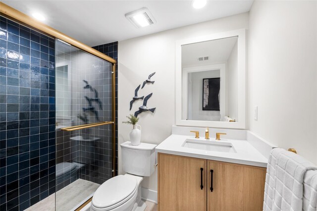 3502 Bennington Dr Unit 113, Fishkill, NY 12524 - bathroom featuring toilet, vanity, tiled shower, and recessed lighting