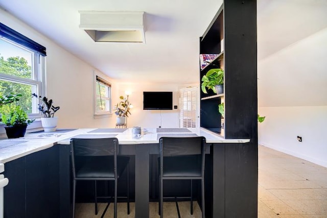 18 Gerow Ln, Cornwall, NY 12553 - kitchen with a breakfast bar and baseboards