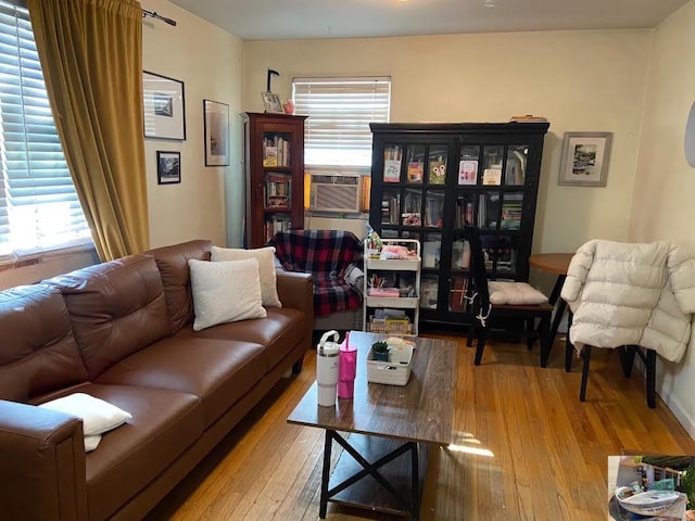 224-43A 64th Ave Unit 43A/545, Oakland Gardens, NY 11364 - living area featuring wood-type flooring and cooling unit