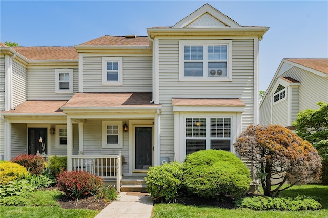 421 Cornwall Meadows Ln, Patterson, NY 12563 - view of front of property with covered porch and a shingled roof