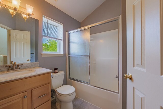 421 Cornwall Meadows Ln, Patterson, NY 12563 - bathroom with vanity, toilet, lofted ceiling, combined bath / shower with glass door, and tile patterned flooring