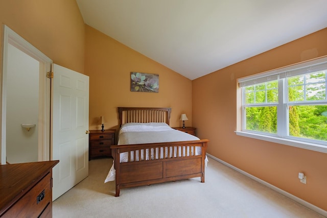 421 Cornwall Meadows Ln, Patterson, NY 12563 - bedroom featuring vaulted ceiling, light carpet, and baseboards
