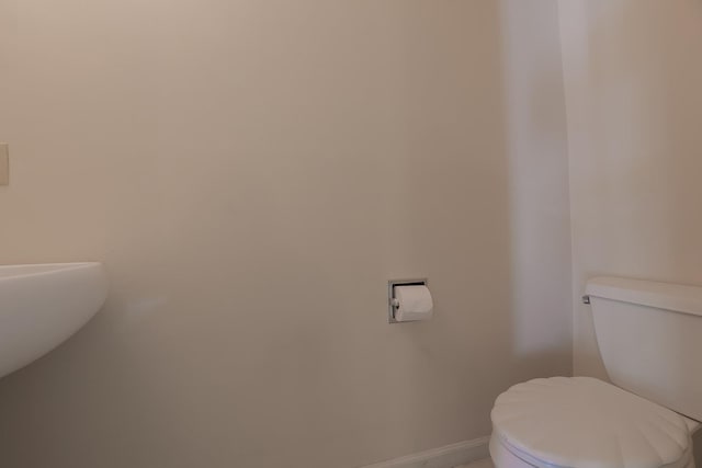 421 Cornwall Meadows Ln, Patterson, NY 12563 - bathroom featuring toilet and baseboards