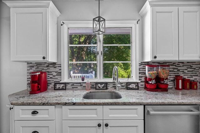 23 Johnson Ln, Millbrook, NY 12545 - kitchen featuring dishwasher, tasteful backsplash, and white cabinets