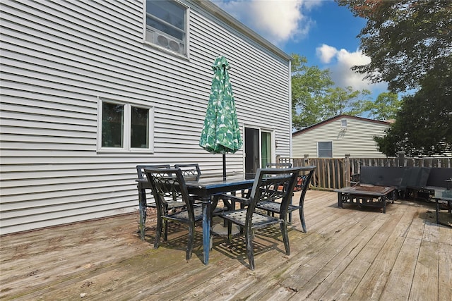 33 Highview Ln, Ridge, NY 11961 - wooden deck featuring outdoor dining area