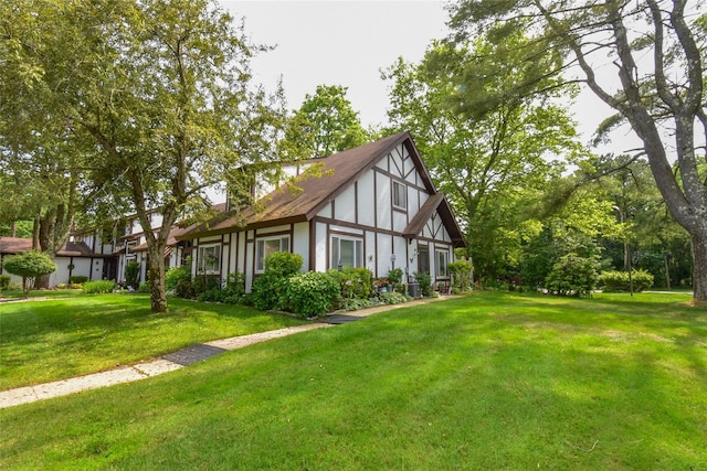 62 Crystal Rock Ct, Middle Island, NY 11953 - view of side of home featuring a yard