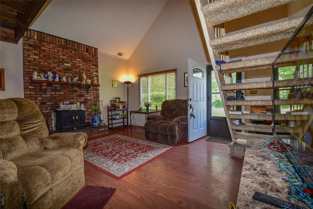 62 Crystal Rock Ct, Middle Island, NY 11953 - living area with wood finished floors, high vaulted ceiling, and a wall unit AC