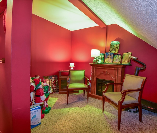 62 Crystal Rock Ct, Middle Island, NY 11953 - living area with carpet flooring, vaulted ceiling, a textured ceiling, and a fireplace