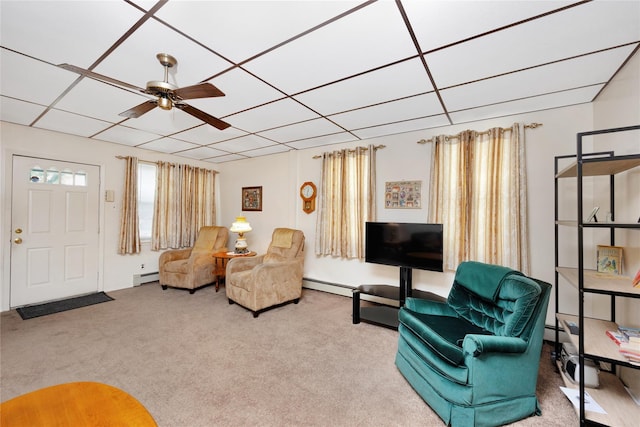 13325 120th St, South Ozone Park, NY 11420 - living area with a baseboard heating unit, carpet floors, a baseboard radiator, ceiling fan, and a paneled ceiling