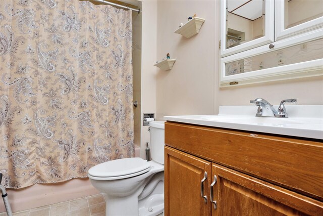 13325 120th St, South Ozone Park, NY 11420 - bathroom featuring vanity, toilet, shower / bath combination with curtain, and tile patterned floors