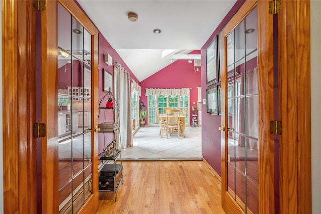 36 Richmond St, Islip, NY 11751 - corridor with vaulted ceiling, wood finished floors, and a skylight