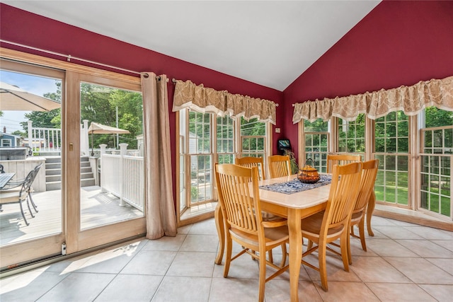 36 Richmond St, Islip, NY 11751 - dining room featuring vaulted ceiling and light tile patterned floors