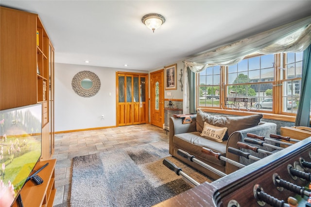 36 Richmond St, Islip, NY 11751 - living room featuring stone tile flooring and recessed lighting