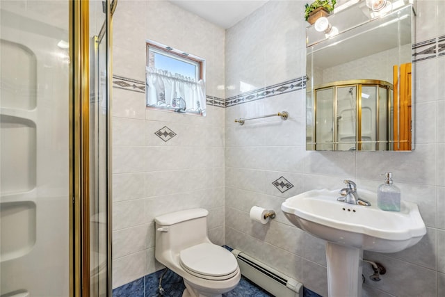 36 Richmond St, Islip, NY 11751 - bathroom featuring a baseboard heating unit, tile walls, and a stall shower