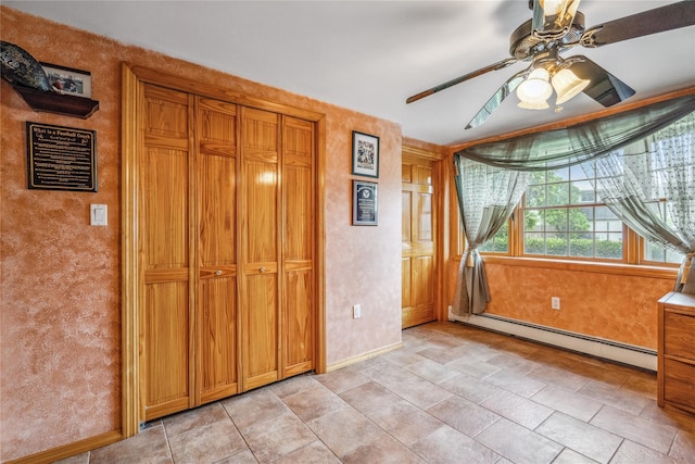 36 Richmond St, Islip, NY 11751 - unfurnished bedroom with a baseboard heating unit, ceiling fan, and a textured wall