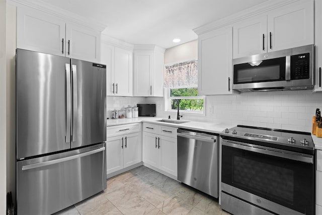 35 Highview Ave, Florida, NY 10921 - kitchen featuring appliances with stainless steel finishes, light countertops, white cabinets, light marble finish floors, and recessed lighting