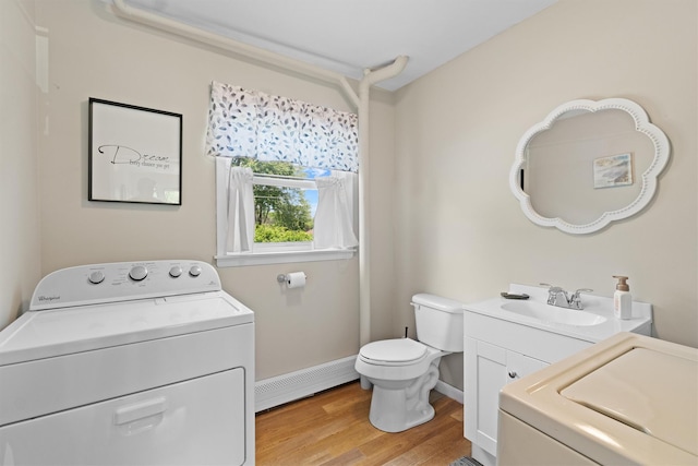 35 Highview Ave, Florida, NY 10921 - laundry area with a baseboard radiator, light wood finished floors, and independent washer and dryer