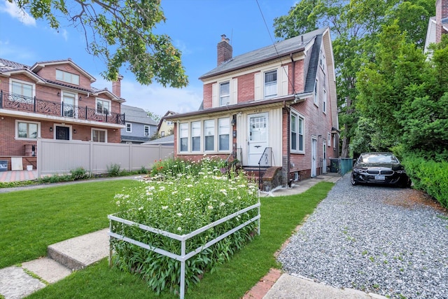 4360 Auburndale Ln, Flushing, NY 11358 - view of front facade with a chimney and brick siding
