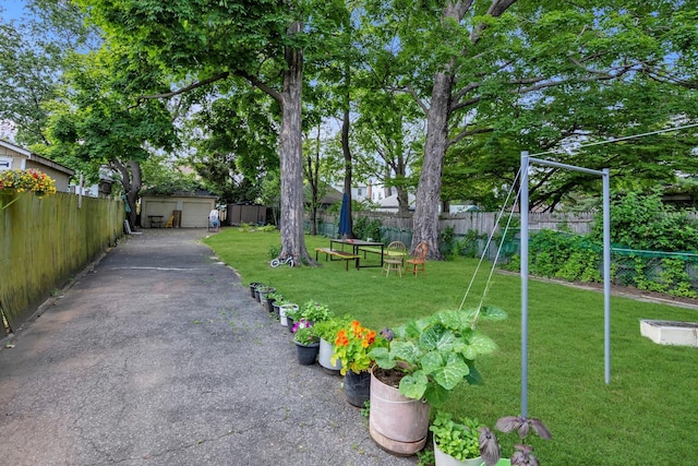 4360 Auburndale Ln, Flushing, NY 11358 - view of yard featuring asphalt driveway
