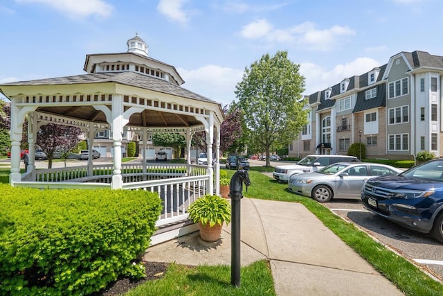 494 Pacing Way Unit 301C, Westbury, NY 11590 - view of property's community featuring a gazebo and uncovered parking