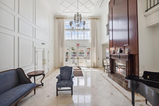 494 Pacing Way Unit 301C, Westbury, NY 11590 - community lobby featuring a towering ceiling and crown molding