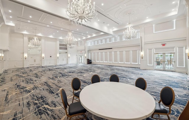 494 Pacing Way Unit 301C, Westbury, NY 11590 - lobby with a decorative wall, a high ceiling, recessed lighting, and crown molding