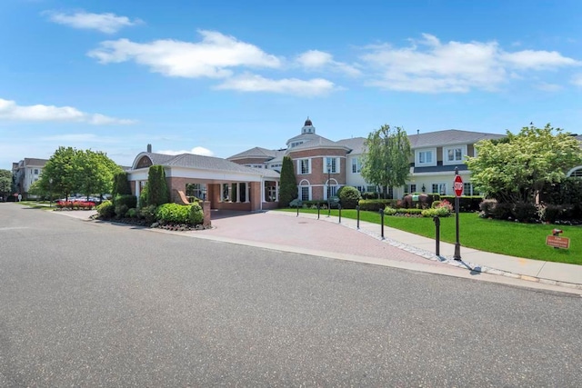 494 Pacing Way Unit 301C, Westbury, NY 11590 - view of front of house with a front yard and a residential view