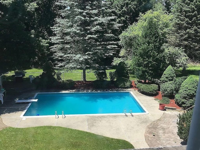 277 Hempstead Rd, Spring Valley, NY 10977 - outdoor pool with a diving board and a patio area