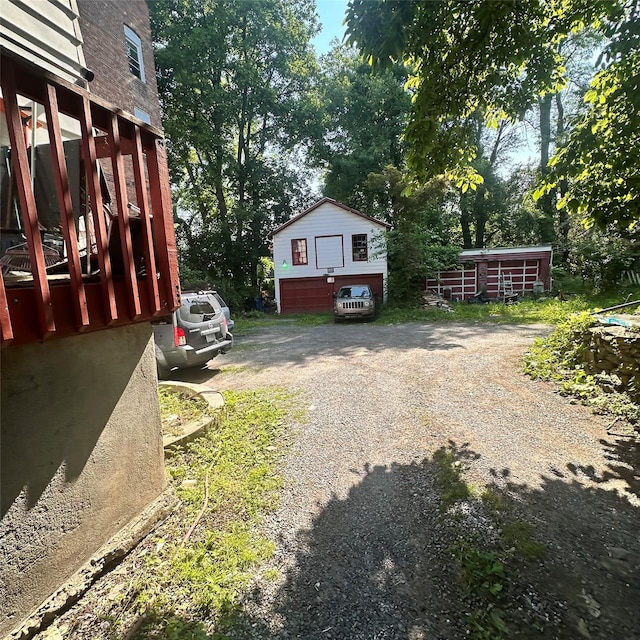 86 S Hamilton St, Poughkeepsie, NY 12601 - view of home's exterior with driveway and view of scattered trees
