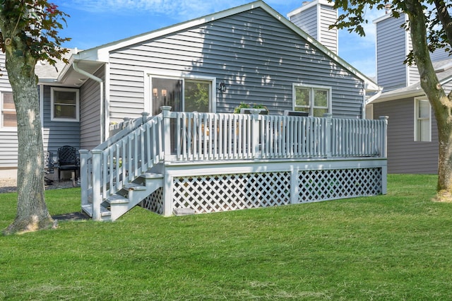 195 Alicia Dr Unit 195, North Babylon, NY 11703 - rear view of house with a lawn, a deck, and a chimney