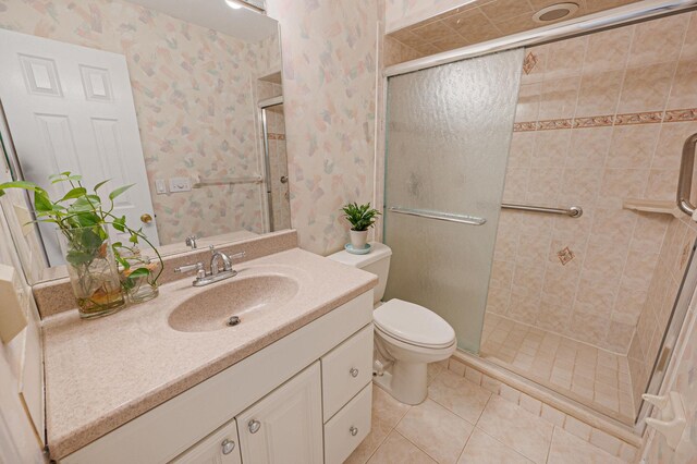 195 Alicia Dr Unit 195, North Babylon, NY 11703 - bathroom with vanity, a stall shower, tile patterned floors, and wallpapered walls