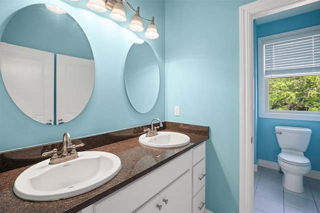 446 M And M Rd, Middletown, NY 10940 - full bathroom featuring double vanity, tile patterned floors, and toilet