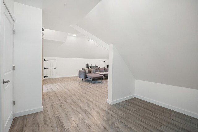 446 M And M Rd, Middletown, NY 10940 - additional living space featuring wood finished floors, baseboards, and vaulted ceiling