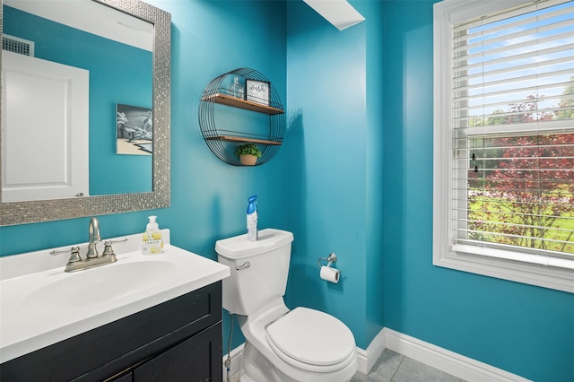 446 M And M Rd, Middletown, NY 10940 - bathroom featuring toilet, vanity, healthy amount of natural light, and tile patterned flooring